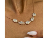 DN2534 - Oval And Round Cut 4.89 Carat Diamond